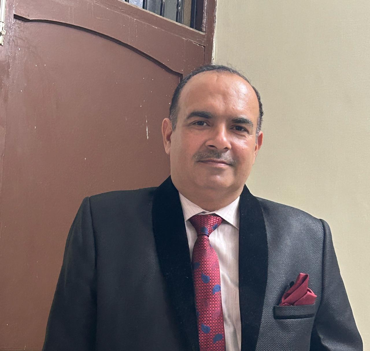 Dr. Rajan Sharma