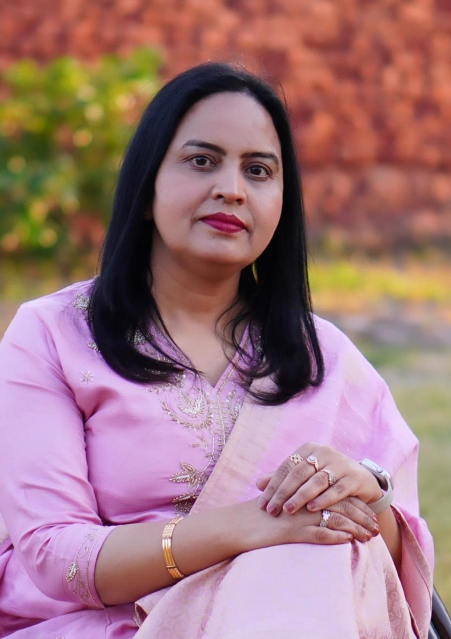 Dr. Mamta Sharma, gynaecologist, holding a newborn